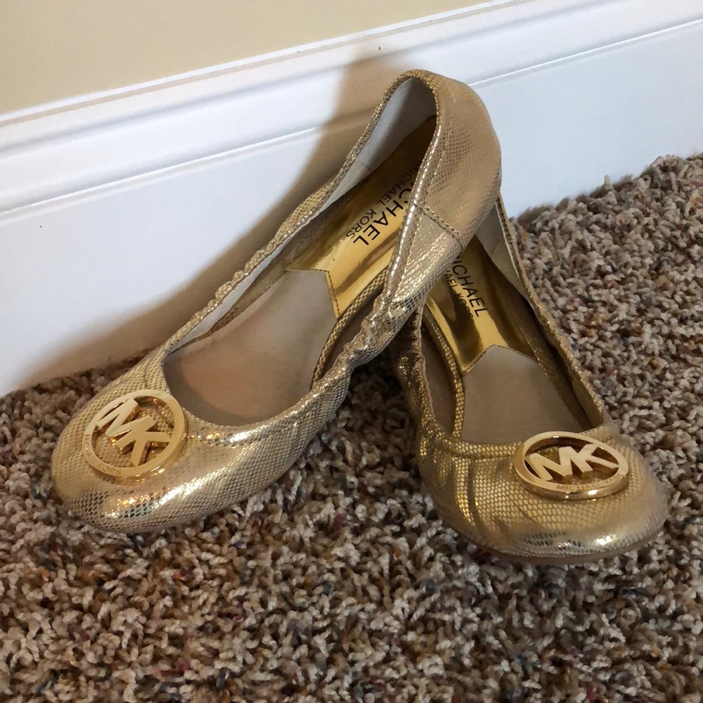 Micheal Kors gold flats